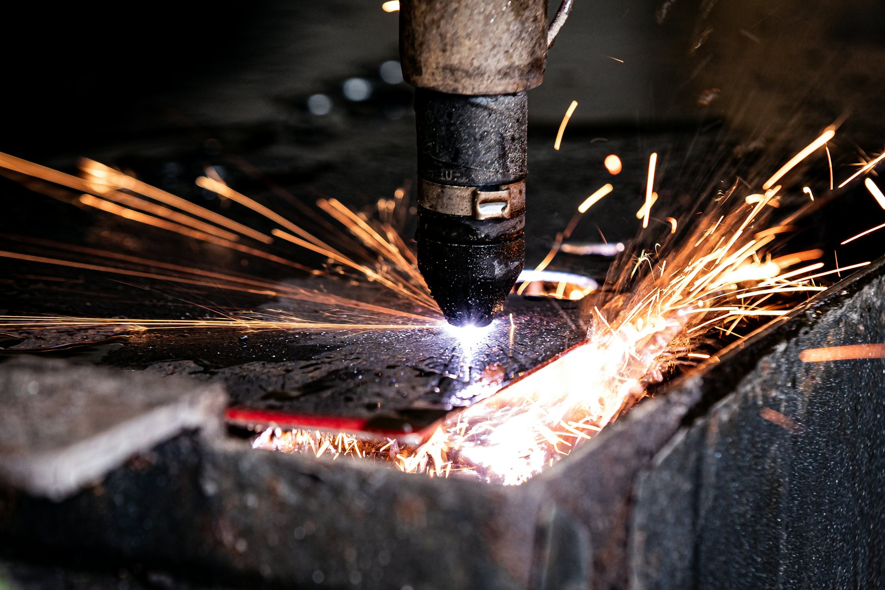 Sparks flying as steel is cut (illustrative stock photo)